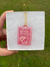 Load image into Gallery viewer, Pink Handbook of the Recently Deceased Necklace
