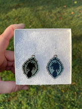 Load image into Gallery viewer, Blue Green Shimmering Medusa Silhouette Earrings
