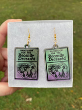 Load image into Gallery viewer, Green &amp; Purple Handbook of the Recently Deceased Earrings
