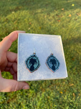 Load image into Gallery viewer, Blue Green Shimmering Medusa Silhouette Earrings
